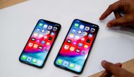 An Apple iPhone Xs Max and iPhone Xs rest on a table during a launch event on September 12, 2018 in Cupertino, California (AFP / Noah Berger) 