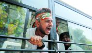 An activist of India’s main opposition Congress Party shouts slogans as he is detained by police during a protest, demanding total waiver of agricultural loans in Gandhinagar, India September 18, 2018. Reuters/Amit Dave