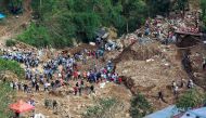 Rescuers continue their search for missing miners in a landslide caused by Typhoon Mangkhut at a small-scale mining camp in Itogon, Benguet, in the Philippines, September 19, 2018. REUTERS/Harlington Palangchao