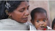 Members of the Dongria Kondh tribe gather on top of the Niyamgiri mountain, which they worship as their living god, to protest against plans by Vedanta Resources to mine bauxite from that mountain near Lanjigarh in India's Orissa state February 21, 2010. 