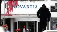 File photo: A view of Novartis building after a group of people from anarchist Ruvikonas conducted a paint attack against the exterior wall of the building on February 25, 2018 in Athens, Greece. (Ayhan Mehmet/Anadolu Agency) 
