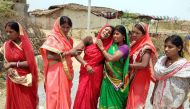In this photograph taken on May 5, 2018 Indian relatives mourn following the rape and murder of a 16-year-old girl on May 3, at Raja Kundra Village in Chatra district of the eastern Indian state of Jharkhand (AFP) 