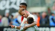 Paris St Germain's Neymar with a pitch invader. Reuters/Stephane Mahe