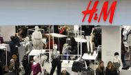 People shop in the newly opened Hennes & Mauritz (H&M) store in Moscow in this March 13, 2009 file photo. Reuters/Denis Sinyakov