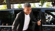 Paris Saint-Germain's forward Kylian Mbappe gestures as he arrives at French football federation (FFF) headquarters prior to his appeal hearing before the FFF disciplinary committee, on September 20, 2018 in Paris. / AFP / Lionel BONAVENTURE