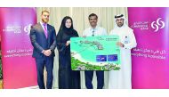 Commercial Bank officials with the bank’s International Spend Campaign winner.