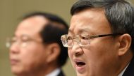 China's Vice Minister of Commerce Wang Shouwen speaks at a press conference in Beijing on September 25, 2018. AFP / Greg Baker
