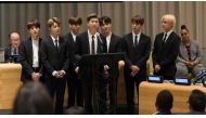 In this photo released by the United Nations, K-Pop band BTS speaks during a meeting focused on youth issues at the United Nations in New York on September 24, 2018. AFP PHOTO / UN/ Mark GARTEN