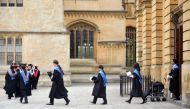 Graduates leave the Sheldonian Theatre after a graduation ceremony at Oxford University, in Oxford, Britain July 15, 2017. Reuters/Hannah McKay