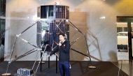 Takeshi Hakamada, CEO of Japanese firm ispace, holds a press conference to explain about the ipsace lunar lander and rover of its lunar programme HAKUTO-R in Tokyo on September 26, 2018. AFP / Natsuko Fukue
