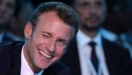 French President Emmanuel Macron listens during the One Planet Summit at the Plaza Hotel on the sidelines of the United Nations General Assembly in New York on September 26, 2018. / AFP / Ludovic MARIN