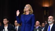 Christine Blasey Ford swears in before testifying in front of the US Senate Judiciary Committee confirmation hearing on Capitol Hill in Washington, DC. September 27, 2018. Saul Loeb/Pool via Reuters