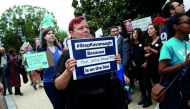 Protesters rally before a hearing where Christine Blasey Ford will testify about an accusation that U.S. Supreme Court nominee Brett Kavanaugh sexually assaulted her in 1982 on Capitol Hill in Washington, U.S., September 27, 2018. Reuters/Joshua Roberts