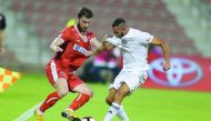 Players of Al Arabi and Al Sailiya vie for ball possession during their QNB Stars League match at Al Arabi Stadium in Doha yesterday.