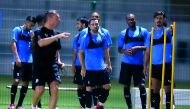 Al Sadd captain Xavi (centre), winger Abdulkarem Hasan (second right) and striker Baghdad Bounedjah (right) during a team's training session, in this file photo.     