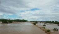 Water levels were within a foot (0.3 meters) of topping Menagers Dam, which could give way and flood Ali Chuk, the National Weather Service said. (Photo courtesy: tucson.com)