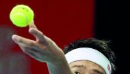 Kei Nishikori of Japan serves during his men's singles second round match against France's Benoit Paire at the Japan Open tennis championships in Tokyo on October 3, 2018. AFP / Toshifumi Kitamura
