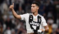 FILE PHOTO: Cristiano Ronaldo. AFP / Marco BERTORELLO
