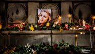 A portrait of slain Bulgarian television journalist Viktoria Marinova during a candle-light vigil in the city of Rousse on October 8, 2018. AFP / Dimitar Dilkoff 