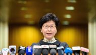Hong Kong Chief Executive Carrie Lam speaks during her weekly address at the government headquarters in Hong Kong on October 9, 2018. / AFP / Anthony WALLACE