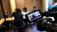 Grace, the wife of the missing Interpol president Meng Hongwey, talks to journalists on October 7, 2018 in Lyon during a press conference during which she did not want her face to be shown, a day after Interpol demanded an official 