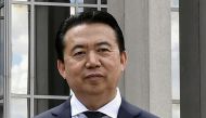 FILE PHOTO: INTERPOL President Meng Hongwei poses during a visit to the headquarters of International Police Organisation in Lyon, France, May 8, 2018. Jeff Pachoud/Pool via Reuters/File Photo