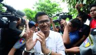 Kyaw Zaw Linn, the editor in charge at Eleven Media arrives after being detained at Tamwe court in Yangon, Myanmar, October 10, 2018. Reuters/Ann Wang 

