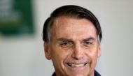 FILE PHOTO: Jair Bolsonaro, far-right lawmaker and presidential candidate of the Social Liberal Party (PSL), casts his vote in Rio de Janeiro, Brazil October 7, 2018. REUTERS/Ricardo Moraes/
