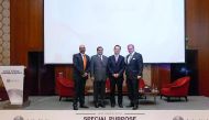 QFC and ISDA officials seen during the conference.