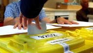 A man casts his vote for the Bavarian state election in Nuremberg, Germany, October 14, 2018. REUTERS/Wolfgang Rattay