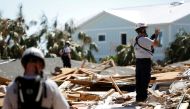 A search and rescue team works in homes destroyed by Hurricane Michael in Mexico Beach, Florida, U.S., October 16, 2018. REUTERS/Terray Sylvester