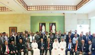 Nakilat officials and Qatar Shipping Forum participants on the sidelines of the event.
