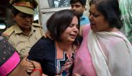 Wife of Vivek Tiwari, a sales manager for Apple, is consoled by her relatives after her husband was shot dead by a police constable in the Gomti Nagar neighbourhood of Lucknow, northern state of Uttar Pradesh, India September 29, 2018. Reuters