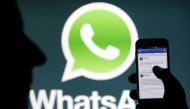 A Whatsapp App logo is seen behind a Samsung Galaxy S4 phone that is logged on to Facebook in the central Bosnian town of Zenica, February 20, 2014. Reuters