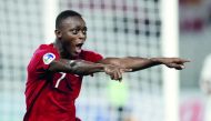 Qatar’s Abdulrasheed Umaru celebrates after scoring a hat-trick during yesterday’s match.