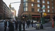 Police gather near the scene of where another package bomb was found early Thursday morning at Robert De Niro's Tribeca Grill restaurant, October 25, 2018 in New York City. (Drew Angerer/Getty Images/AFP)