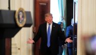 US President Donald Trump arrives to deliver remarks at the 