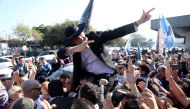 FILE PHOTO: Presidential candidate Jair Bolsonaro arrives at the Salgado Filho airport to attend a rally in Porto Alegre, Brazil August 29, 2018. REUTERS/Diego Vara/File photo