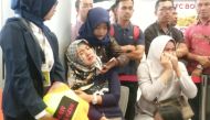 Relatives of passengers of Lion Air flight JT610 that crashed into the sea, cry at Depati Amir airport in Pangkal Pinang, Indonesia, October 29, 2018. Antara Foto/Elza Elvia via REUTERS 