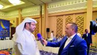 Qatar Sports Press Committee board member, Mubarak Al Boainin speaking to a journalist at the AIPS Executive Committee & Jury Meet, in Doha yesterday.