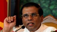 (FILES) In this file photo taken on October 3, 2015 Sri Lankan President Maithripala Sirisena makes a televised statement from his official residence in Colombo. AFP / Lakruwan WANNIARACHCHI