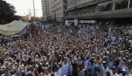 Pakistani supporters of the Jamiat Ulema-e-Islam-Fazl (JUI-F), a hardline religious political party, chant slogans during a protest following the Supreme Court decision to acquit Christian woman Asia Bibi, in Karachi on November 1, 2018. / AFP / ASIF HASS