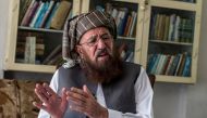 FILE PHOTO: Maulana Sami-ul Haq, a Pakistani cleric and head of Darul Uloom Haqqania, an Islamic seminary and alma mater of several Taliban leaders, talks during an interview with Reuters at his house in Akora Khattak, Khyber Pakhtunkhwa province Septembe