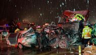 Chinese police officers and rescuers work at the site of where a truck ploughed into cars at a toll booth in Lanzhou in China's northwestern Gansu province early on November 4, 2018. China OUT / AFP / STR 