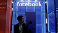 A Facebook sign is seen during the China International Import Expo (CIIE), at the National Exhibition and Convention Center in Shanghai, China November 5, 2018. REUTERS/Aly Song