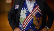 Chuck Keiper 57 shows off a vest he has worn as an election official for 12 years at the Franklin Elementary School on November 6, 2018 in Kent, Ohio.  Jeff Swensen/Getty Images/AFP 