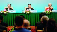 World Bank President Jim Yong Kim (L), Chinese Premier Li Keqiang (C) and International Monetary Fund (IMF) Managing Director Christine Lagarde attend a news briefing after the Third Round Table Dialogue in Beijing on November 6, 2018. AFP/ Thomas Peter
