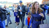 US Senate candidate Rep. Beto O’Rourke, his wife Amy Sanders (right) and their children Henry, Ulysses and Molly, walk back home after voting at El Paso Community College-Rio Grande Campus on Election Day in El Paso, yesterday. 