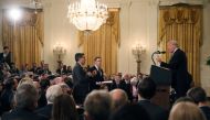 CNN's Jim Acosta (L) questions US President Donald Trump during his news conference following Tuesday's midterm U.S. congressional elections at the White House in Washington, U.S., November 7, 2018. Reuters/Jonathan Ernst