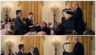 A White House staff member reaches for the microphone held by CNN's Jim Acosta as he questions U.S. President Donald Trump during a news conference following November 7, 2018. Reuters/Jonathan Ernst
 